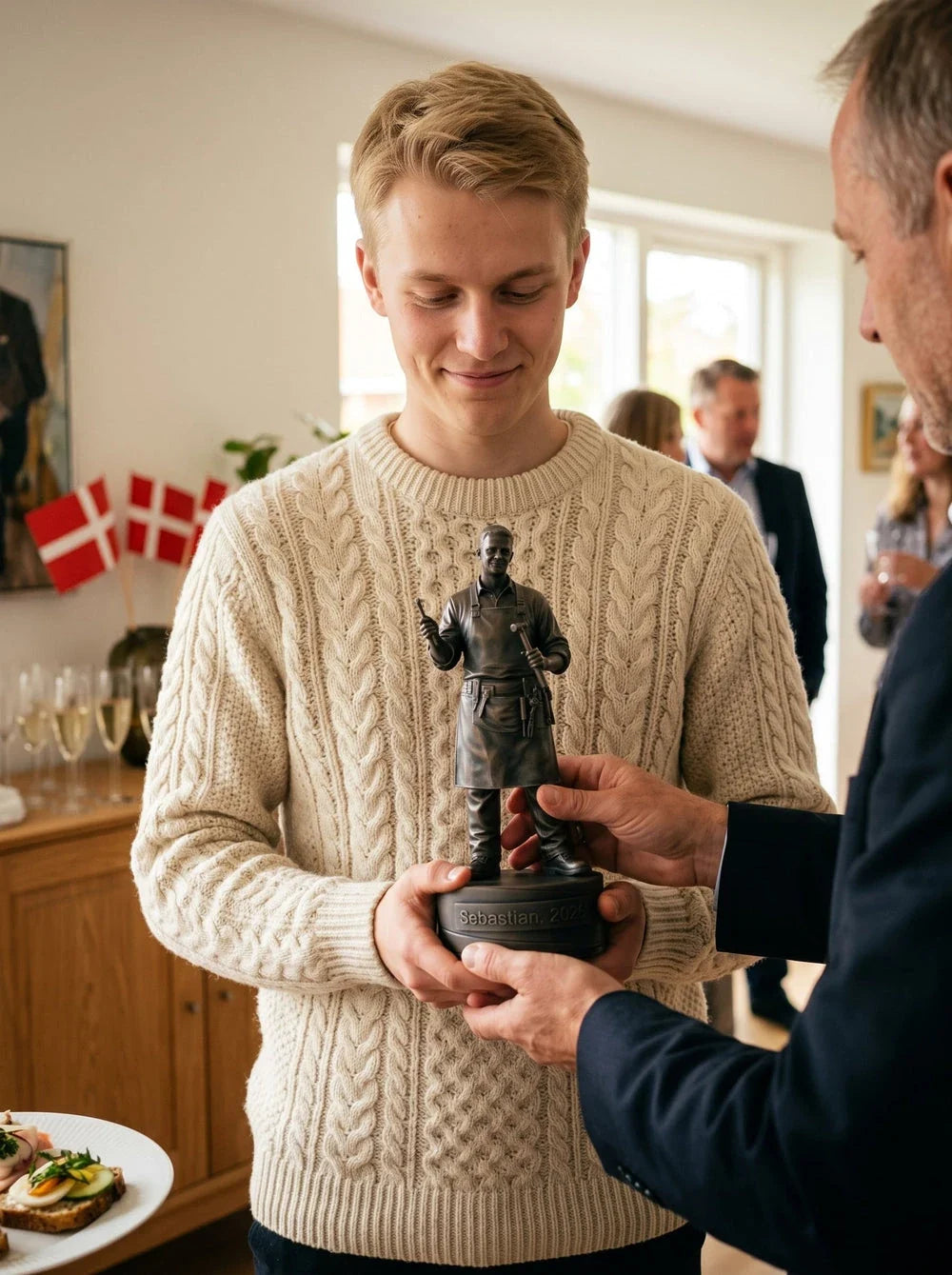Guldsmedefigur han 